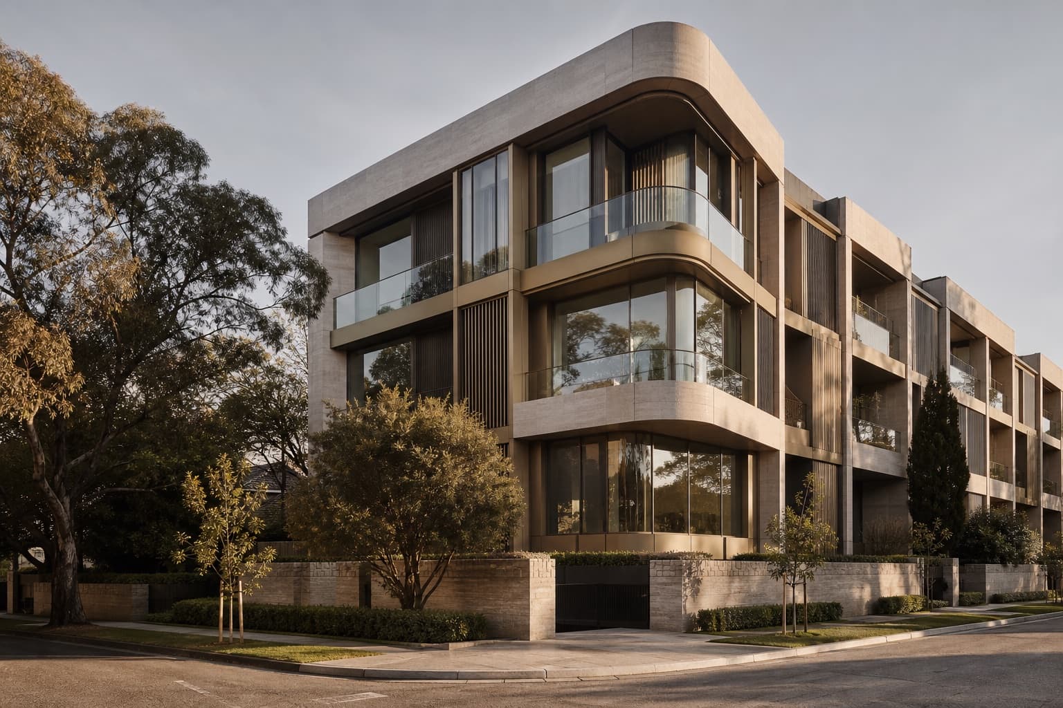 Stone-clad residential building with glass balconies and mature trees